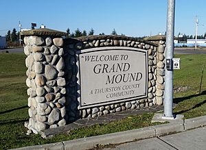 Town sign for Grand Mound, located at main intersection