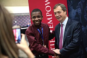 Nigel Farage with attendee (46400882322)