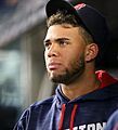 Red Sox prospect Yoan Moncada looks on from the dugout. (29997392685)