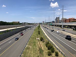 2019-06-26 12 17 29 View south along Interstate 95 and west along Interstate 495 (Capital Beltway) from the overpass for the ramp connecting Mill Road to Interstate 95 northbound and Interstate 495 eastbound in Alexandria, Virginia