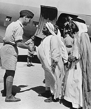 Air Commodore Whitney Straight, Air Officer Commanding RAF Transport Command, Middle East, saying goodbye to the Sheikh Khalifa, cousin of the ruler of Bahrain, and his two sons, 18 January 1945. CM6013