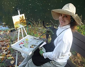 Artist Emma Auriemma painting at Echo Lake Park in Mountainside New Jersey
