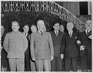 L to R, Gen. Harry Vaughan, Soviet leader Josef Stalin, Charles Bohlen, interpreter for President Truman, V. N.... - NARA - 198809