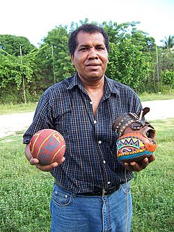 Pelota mixteca ball, glove, & player (S Kraft)