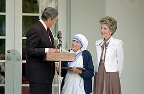 President Ronald Reagan presents Mother Teresa with the Medal of Freedom at a White House Ceremony in the Rose Garden