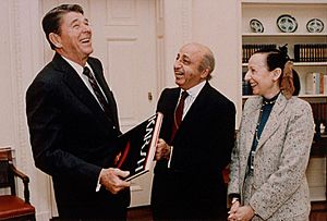 Yousuf and Estrellita Karsh with Ronald Reagan