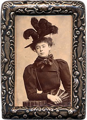 Alice Askew in feather hat - framed