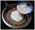 Lakh - arraw millet porridge 3. fermented milk topping