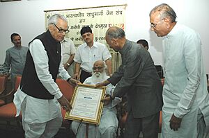 The Vice President, Shri Bhairon Singh Shekhawat presenting Shri Naresh Samata Puraskar to Shri Nanaji Deshmukh, in New Delhi on April 8, 2006