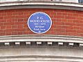 round blue plaque marking Wodehouse's residence, reading: P.G. Wodehouse, 1881–1975: Writer, lived here