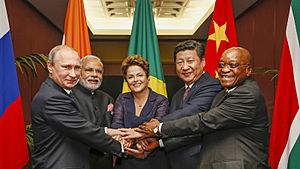 BRICS heads of state and government hold hands ahead of the 2014 G-20 summit in Brisbane, Australia (Agencia Brasil)