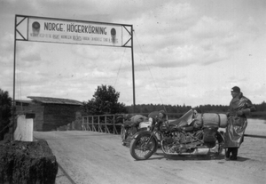 Danish motorcyclists about to cross the border between Sweden and Norway in 1934