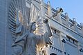 Detail of statue on the outside of the Bass Performance Hall at sunset