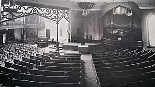 Pews, chairs and a large pipe organ