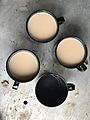 Mugs of tea viewed from above