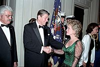 President Ronald Reagan shaking hands with singer Barbara Mandrell