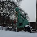 view of the Burnside Fountain surrounded by snow with a scarf wrapped around Turtle Boy's neck 