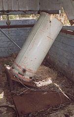 Barrack Buster improvised mortar with base plate and detonator wires
