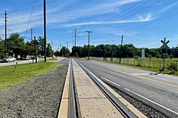 Railroad crossing Main Street near East Spotswood Park