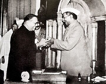 Dr. Babasaheb Ambedkar, chairman of the Drafting Committee, presenting the final draft of the Indian Constitution to Dr. Rajendra Prasad on 25 November, 1949