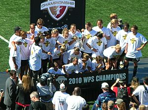 FC Gold Pride pose with 2010 WPS Championship Trophy 6