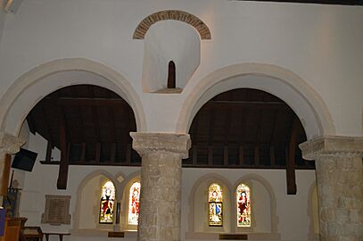 Fetcham, St Mary's Church, Norman pillars and Saxon window