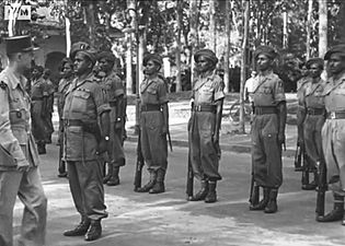 General Leclerc reviews Indian troops in Saigon 1945
