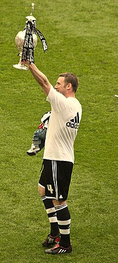 Kevin Nolan with Championship trophy