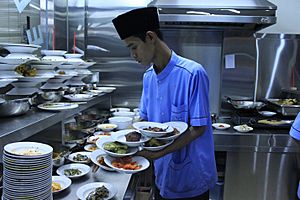 Waiter at a Padang restaurant
