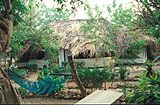1014219-Hut at the Jangjangbureh Camp-The Gambia