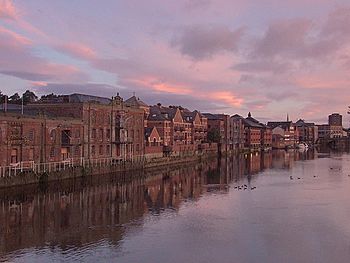 Brick buildings on the riverside in the city of York at sunrise