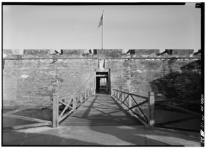 ENTRANCE TO THE CASTILLO, DRAWBRIDGE AND DOORWAY WITH SPANISH ROYAL COAT-OF-ARMS (ERECTED 1756) - Castillo de San Marcos, 1 Castillo Drive, Saint Augustine, St. Johns County, FL HABS FLA,55-SAUG,1-26