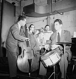Eddie Safranski, Kai Winding, Stan Kenton, Pete Rugolo, and Shelly Manne, ca. Jan. 1947 (William P. Gottlieb 05041)