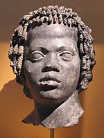 Marble head of Nubian denizen