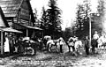 Packtrain at the Montegue and Moore store in Darrington, Washington, ca 1905 (WASTATE 487)