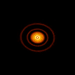 Safe havens for young planets AS 209