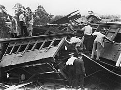 StateLibQld 2 102560 Rescuers inspect the wreckage of the Camp Mountain train disaster, 1947