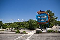 The Weirs Beach sign, located at the beginning of Lakeside Ave.