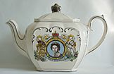 A commemorative teapot marking the Queen's Silver Jubilee