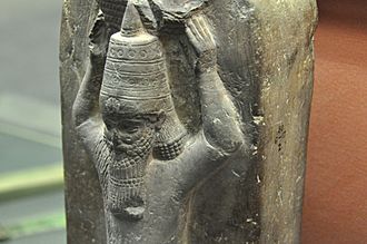 Detail of a stone monument of Ashurbanipal II as a basket-bearer. 668-655 BCE. From the temple of Nabu at Borsippa, Iraq, currently housed in the British Museum