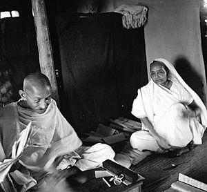 Gandhi and Kasturba seated