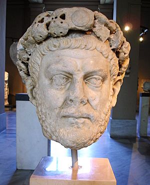 Statue of a male head wearing a diadem