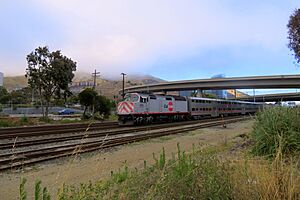 Northbound train passing Butler Road station site, July 2018