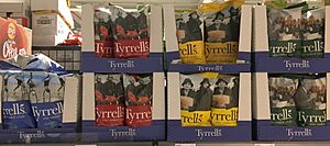 Shelf with 4 varieties of Tyrrells potatoe chips (cropped)