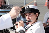 US Navy 070112-N-3228G-001 Musician 3rd Class Cassy DeMoss of the Pacific Fleet Band performs at the decommissioning ceremony for the rescue and salvage ship USS Salvor (ARS 52)