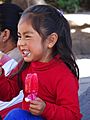 Young Girl with Popsicle in Plaza - Valle de Bravo - Mexico (16489189685)