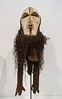 Face mask (kifwebe) and costume, Songye peoples, Democratic Republic of the Congo, late 19th to early 20th century, wood, paint, fiber, cane, gut - Dallas Museum of Art - DSC04932