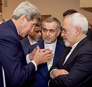 John Kerry Speaks With Hossein Fereydoun and Javad Zarif before Press conference in Vienna (19663913956) cropped