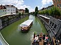 Ljubljana old town with excursion boat
