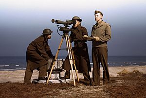 Men of Fort Story operate an azimuth instrument, to measure the angle of splash in sea-target practice